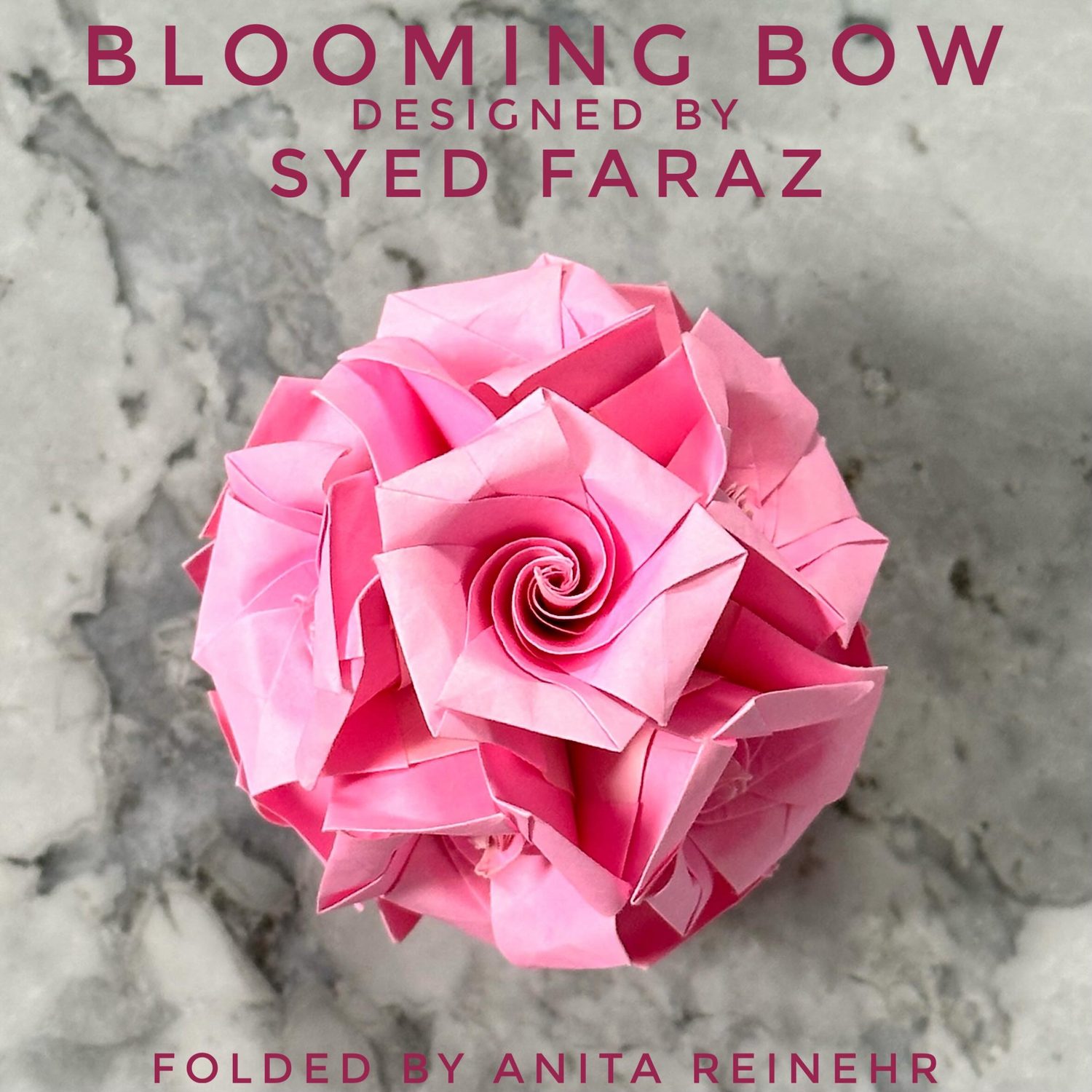 Blooming Bow origami kusudama in pink, designed by Syed Faraz